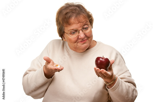 Confused Senior Woman Holdi...