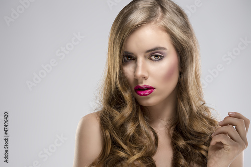 girl with flowing hair portrait turned of three quarters