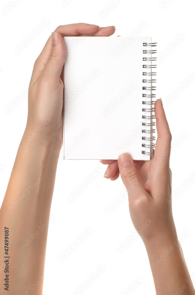 Hands holding notebook isolated on white Hands holding notebook isolated on white