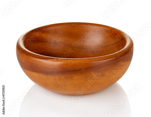 Wooden bowl isolated on white © Africa Studio