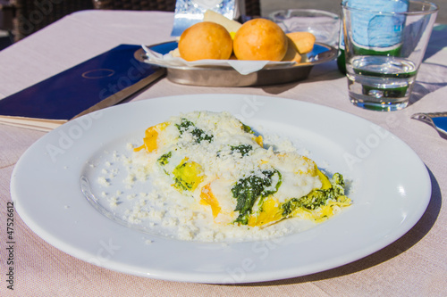 Crespelle with parmesan from Bologna, Italy photo