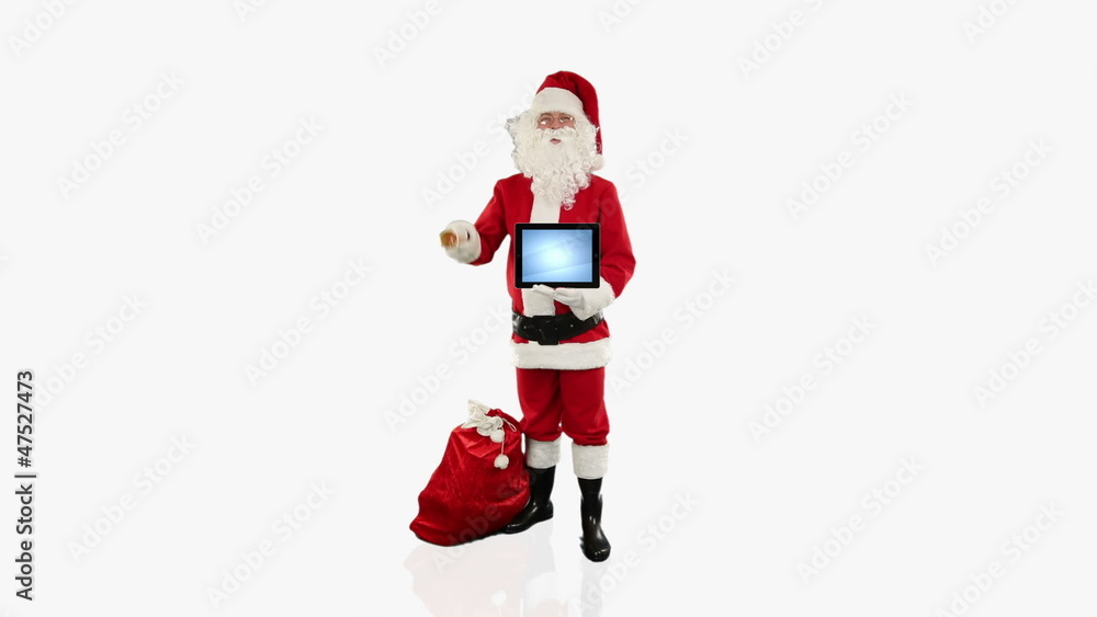 Santa Claus presenting a white sheet, against white Santa Claus presenting a white sheet, against white
