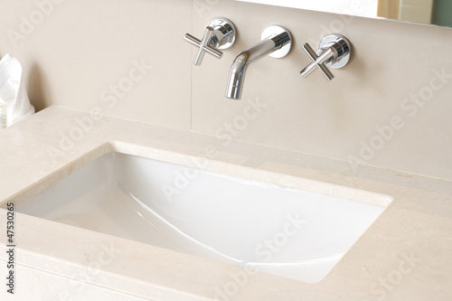 Hand wash basin with faucet