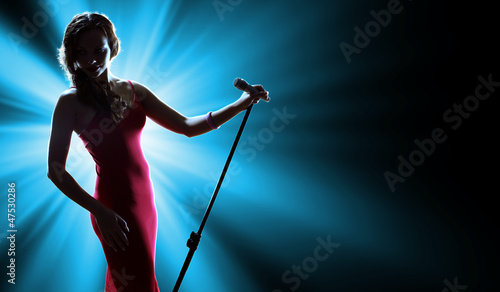 Female singer on the stage © Sergey Nivens