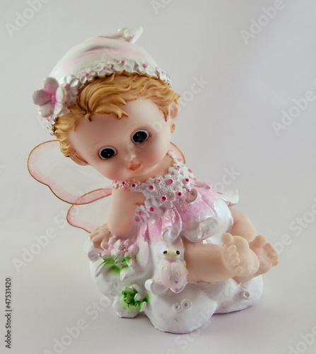 Figurine little pink pixie in the cap