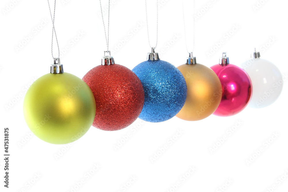 Multiple hanging Christmas ball on white background. Multiple hanging Christmas ball on white background.