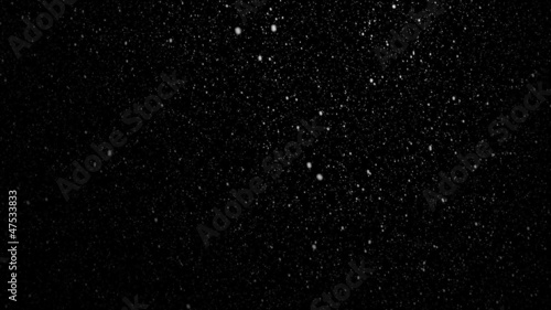 Snow, isolated on black background, loop photo