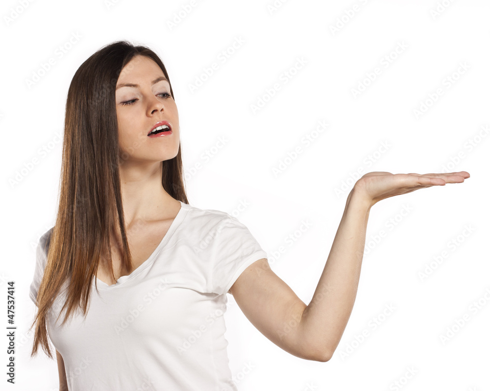 Student in the studio, open palm. white background Student in the studio, open palm. white background