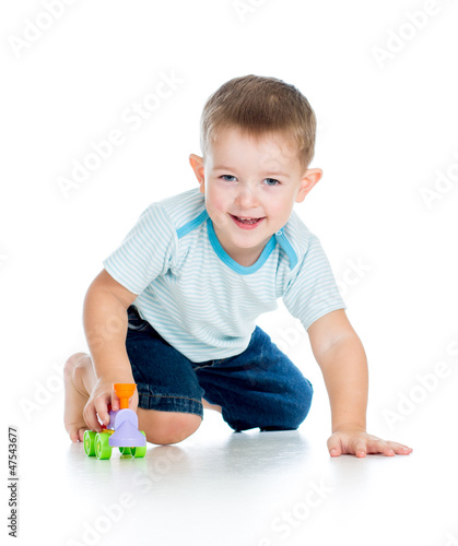 funny boy kid playing with toy