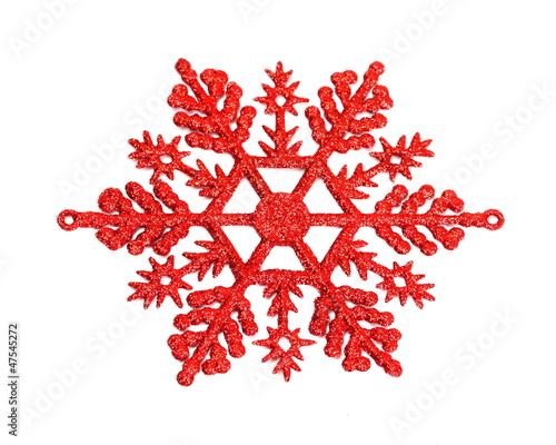 Red snowflake isolated on white background