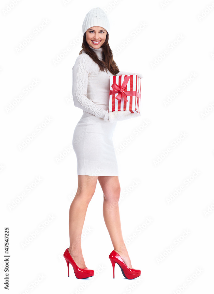 Beautiful young Christmas girl with a present. Beautiful young Christmas girl with a present.