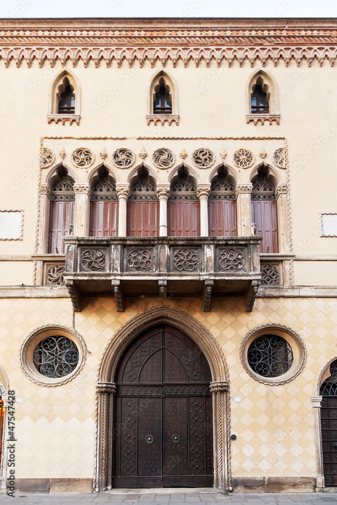 door, balcony of medieval house in Bologna
