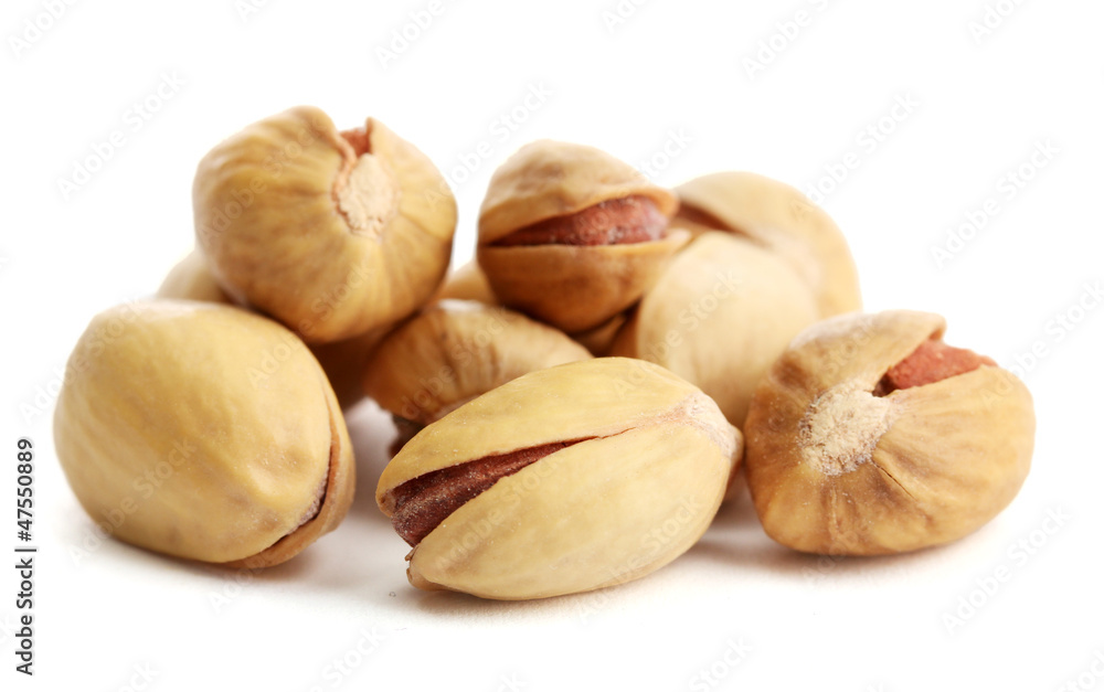 tasty pistachio nuts, isolated on white tasty pistachio nuts, isolated on white