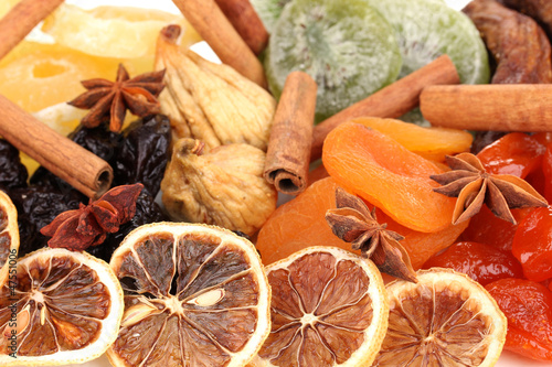 Dried fruits with cinnamon and star anise close-up