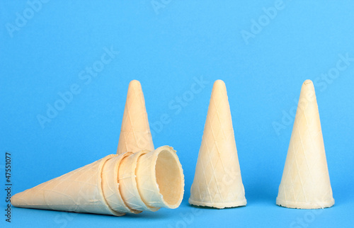 Waffle cones for ice cream on blue background