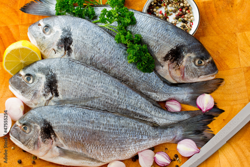 Seafood, fish - fresh sea dorada in cuisine Seafood, fish - fresh sea dorada in cuisine