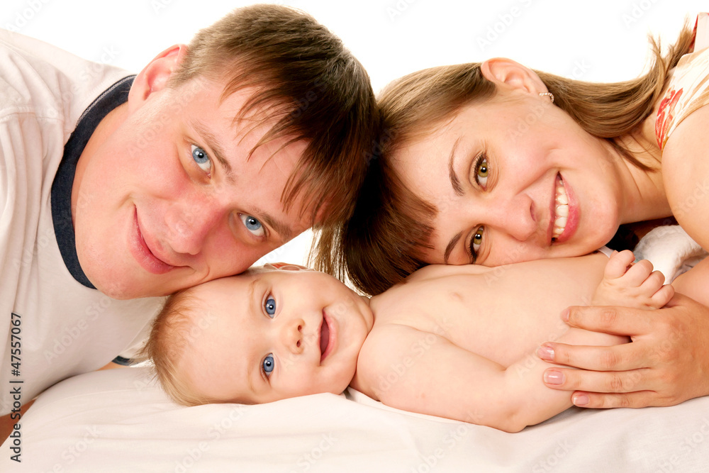 Happy family, smiling father, mother and baby. Happy family, smiling father, mother and baby.