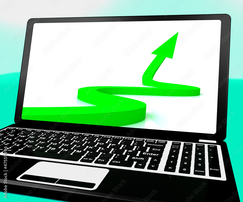 Arrow Pointing Up On Laptop Shows Improvement And Success Arrow Pointing Up On Laptop Shows Improvement And Success