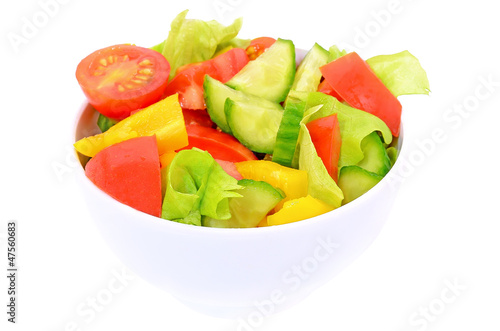 Fresh vegetable salad in white bowl