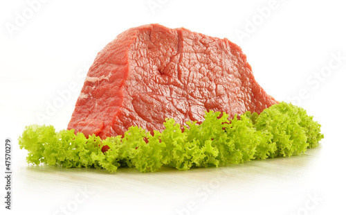Photo Composition with piece of beef meat and lettuce
