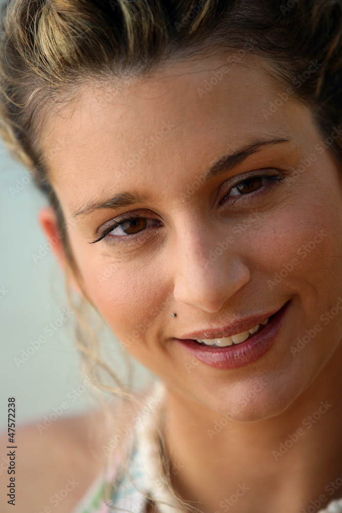 Naklejka premium Portrait of young woman