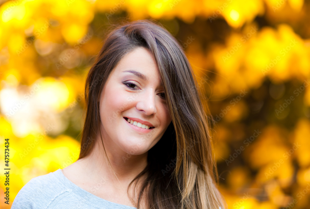 Smiling woman in an autumn park Smiling woman in an autumn park