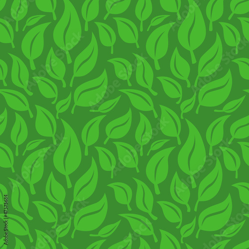 Vector seamless background with green leaves