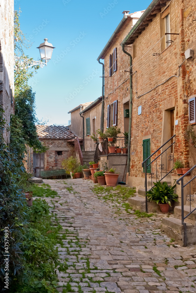 Alley in Chiusdino medieval village, Tuscany