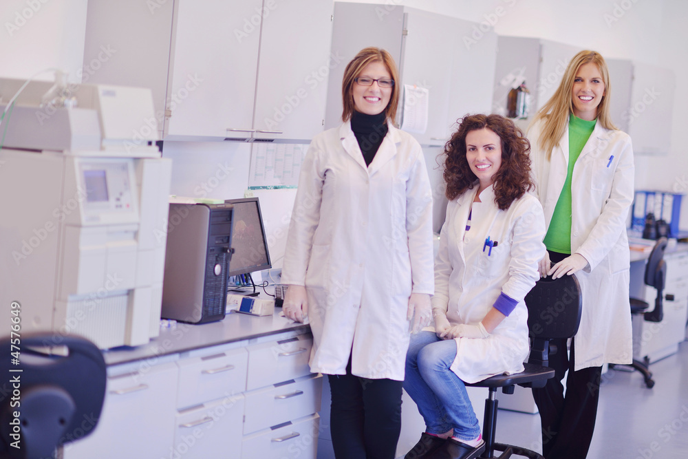 scientists working at the laboratory scientists working at the laboratory