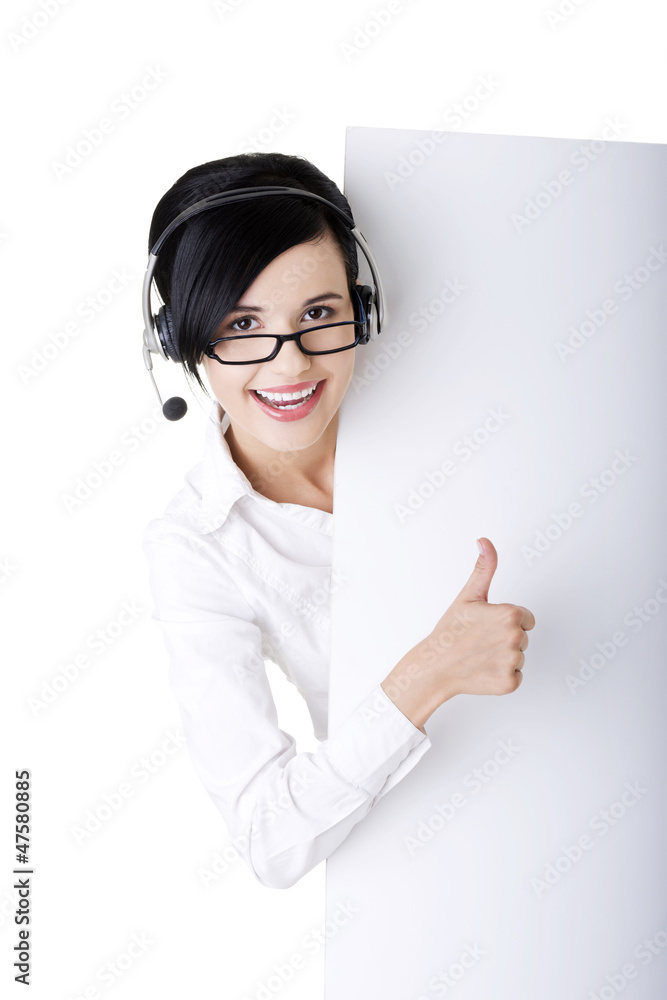 Call center worker holding blank sign board Call center worker holding blank sign board