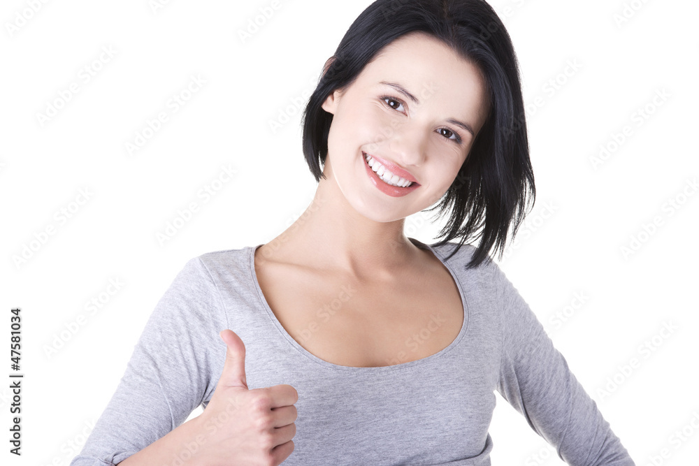 Beautiful young woman gesturing thumbs up. Beautiful young woman gesturing thumbs up.