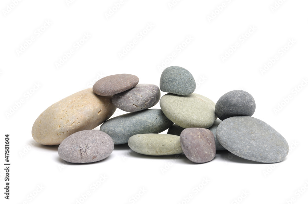 Stacked colorful sea stones on white background Stacked colorful sea stones on white background