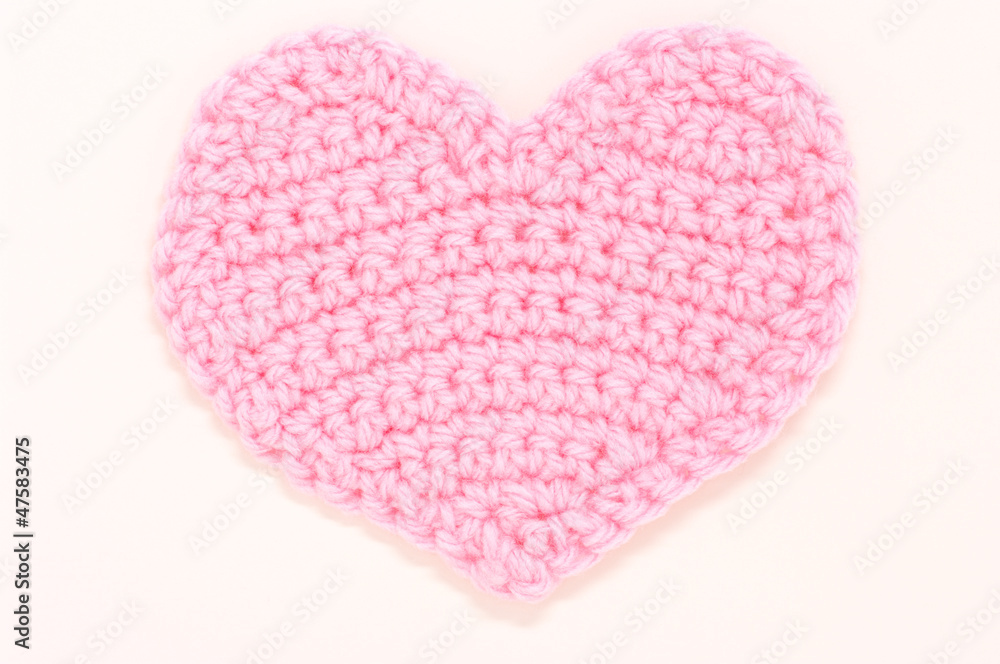 Pink knitted heart.