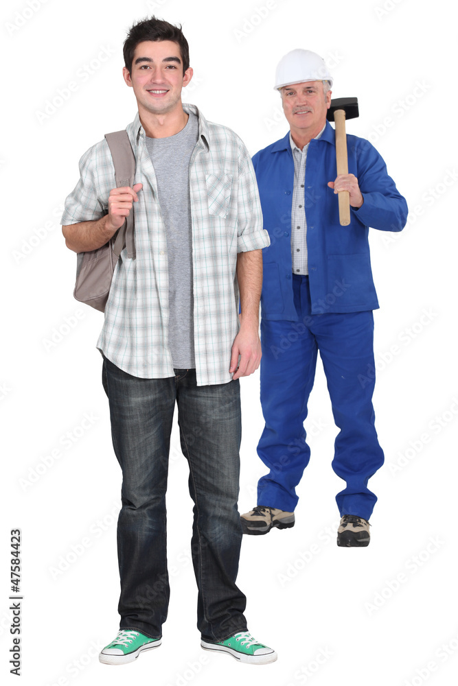 Young apprentice standing near his boss Young apprentice standing near his boss