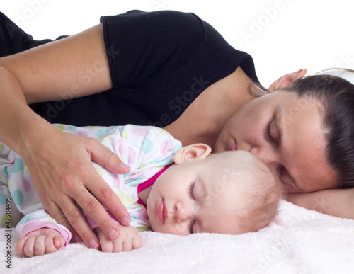 baby sleeping with mother