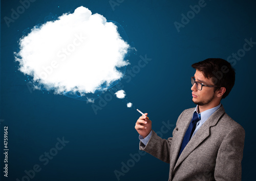 Young man smoking unhealthy cigarette with dense smoke