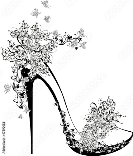 Shoes on a high heel decorated with flowers and butterflies