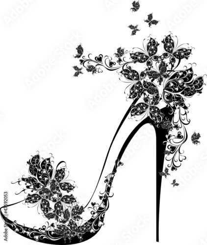 Shoes on a high heel decorated with flowers and butterflies