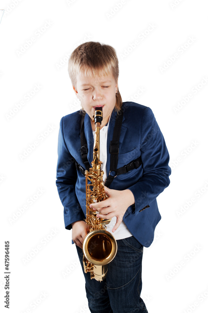 Fototapeta premium Young boy playing the sax