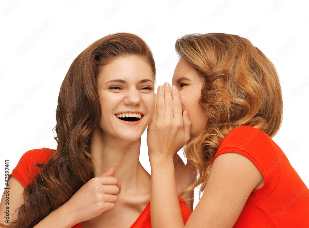 two talking teenage girls in red t-shirts two talking teenage girls in red t-shirts