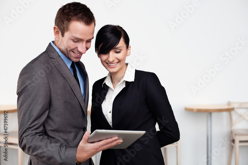 Business meeting with digital tablet