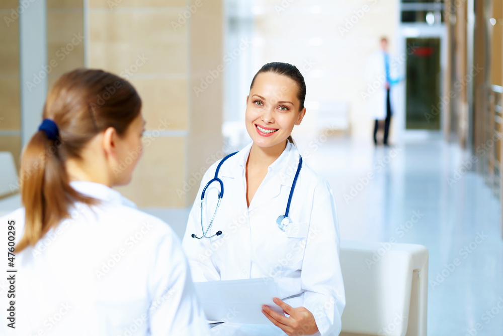 Portrait of two friendly female doctors Portrait of two friendly female doctors