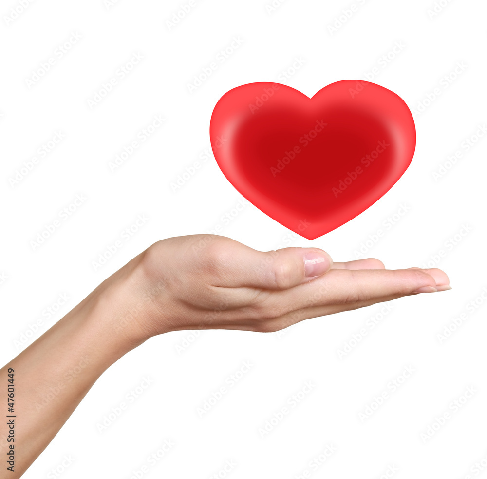 Red heart in woman hand. Love and heath symbol isolated on white Red heart in woman hand. Love and heath symbol isolated on white