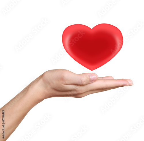 Red heart in woman hand. Love and heath symbol isolated on white