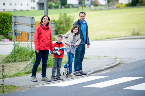 Family will passing the Crosswalk
