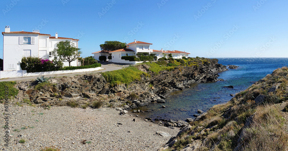 Fototapeta premium Panorama on a cove with waterfront house, village of Cadaques, Costa Brava, Catalonia, Spain, Mediterranean sea
