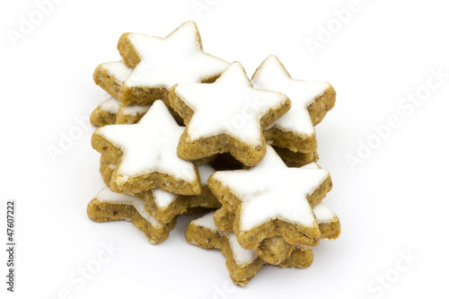 typical christmas cinnamon star cookies and cinnamon sticks