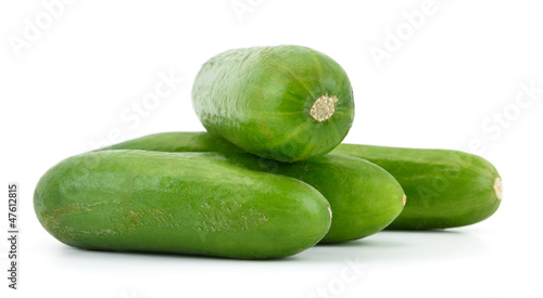 Heap of cucumbers isolated on white background