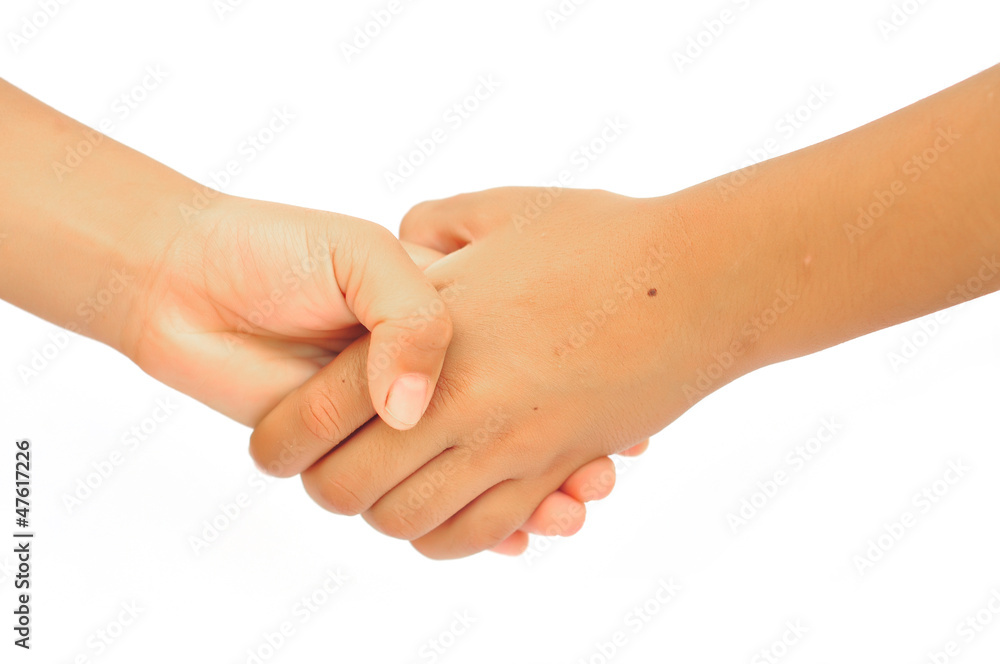 Shaking hands of boy and young