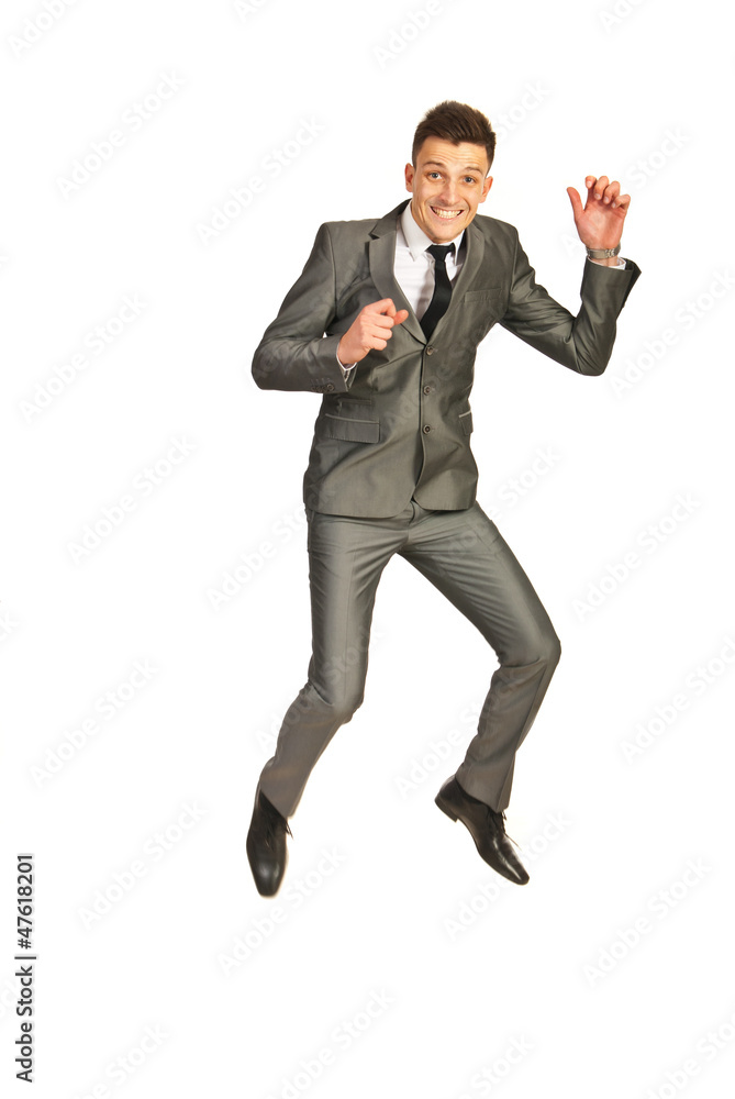 Jumping happy business man